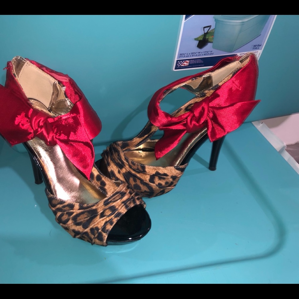 cheetah heels with red satin bow